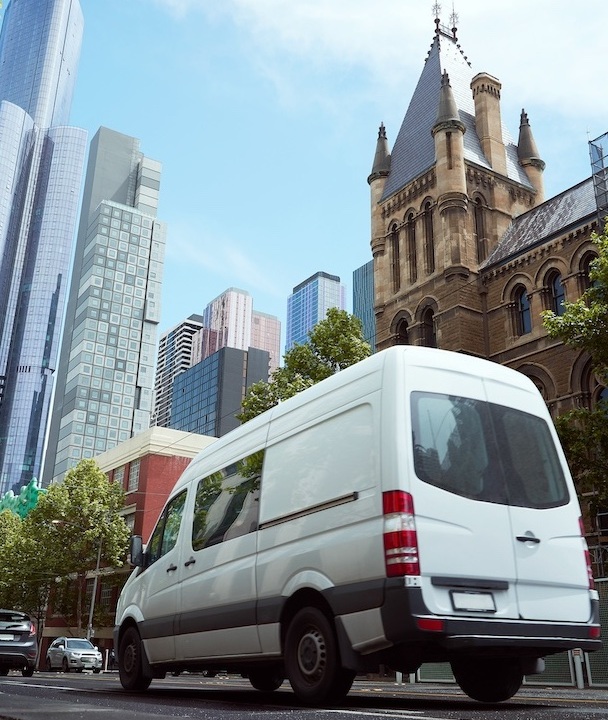Delivery white van in the city street