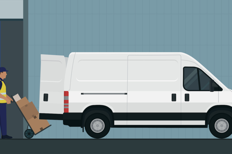 Man loading packages into the van